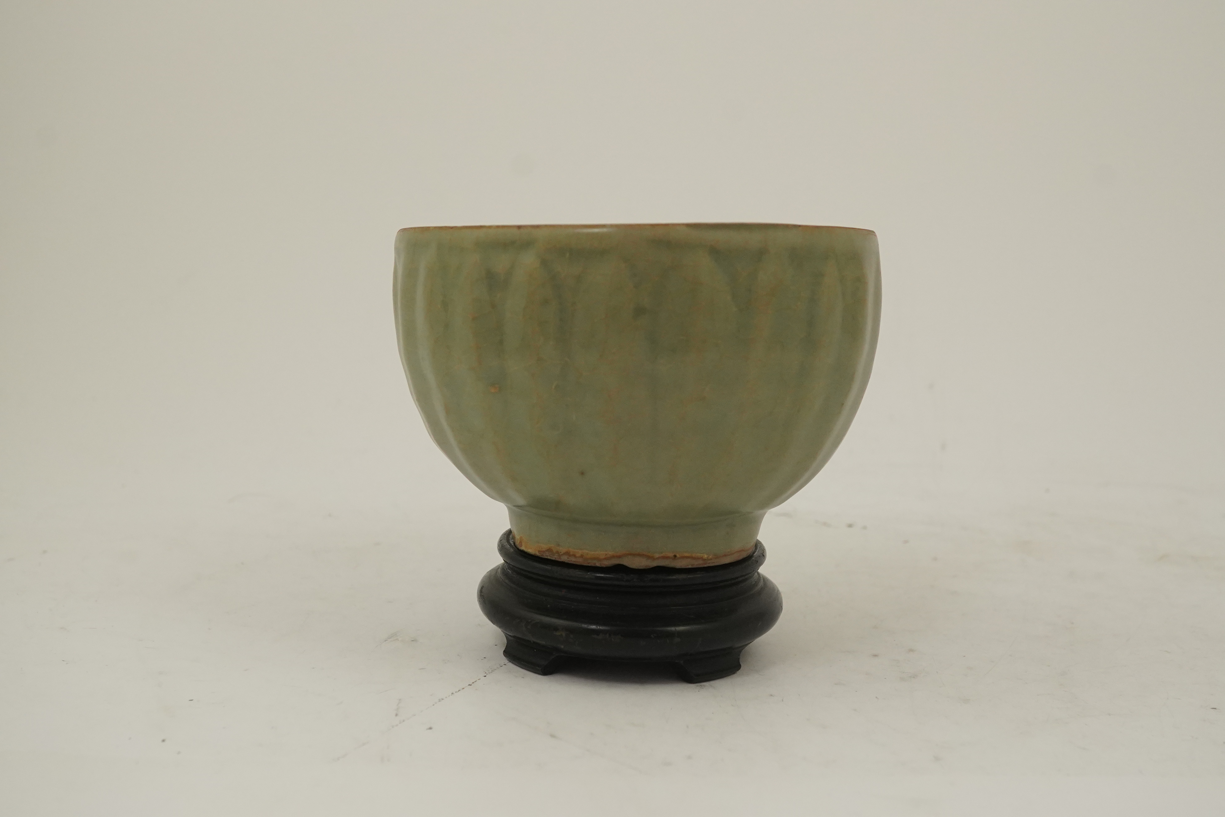 A Chinese Longquan celadon petal lobed deep bowl, Southern Song/Yuan dynasty, 13th century